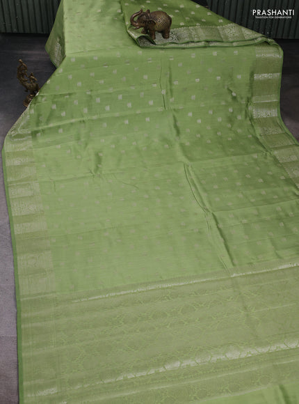 Chiniya silk saree pista green with allover zari woven buttas and zari woven border