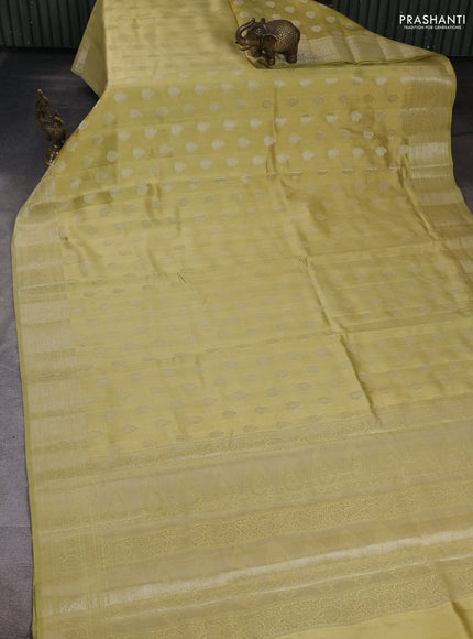 Chiniya silk saree pale yellow with allover zari woven buttas and zari woven border
