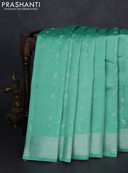 Chiniya silk saree teal shade with allover zari woven buttas and zari woven border