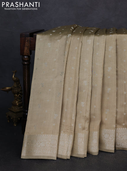 Chiniya silk saree elaichi green with allover zari woven buttas and zari woven border