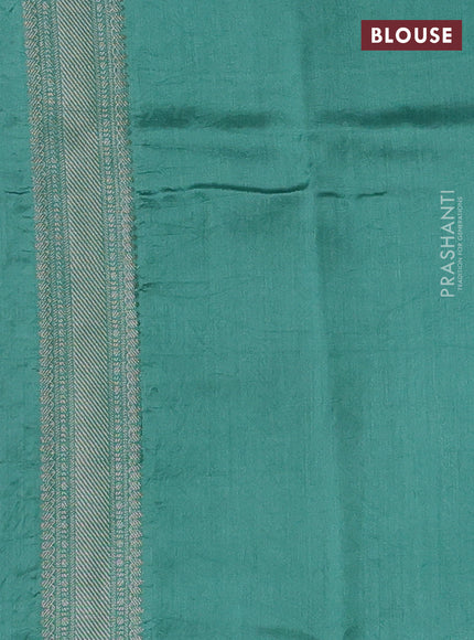 Chiniya silk saree teal blue shade with allover zari woven buttas and zari woven border
