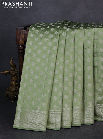 Chiniya silk saree pastel green with allover zari woven buttas and zari woven border