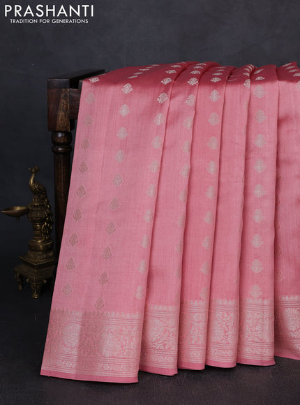 Chiniya silk saree peach shade with allover zari woven buttas and zari woven border