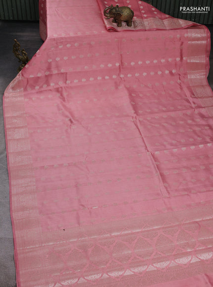 Chiniya silk saree peach shade with allover zari woven buttas and zari woven border
