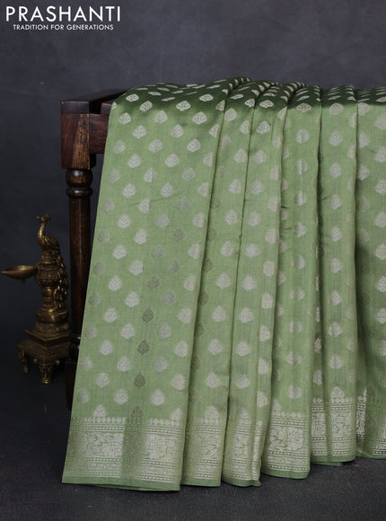 Chiniya silk saree pastel green with allover zari woven buttas and zari woven border