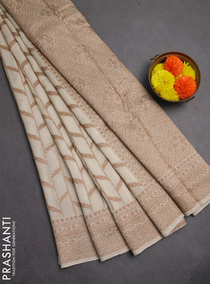 Banarasi semi raw silk saree cream with allover thread & zari weaves and woven border