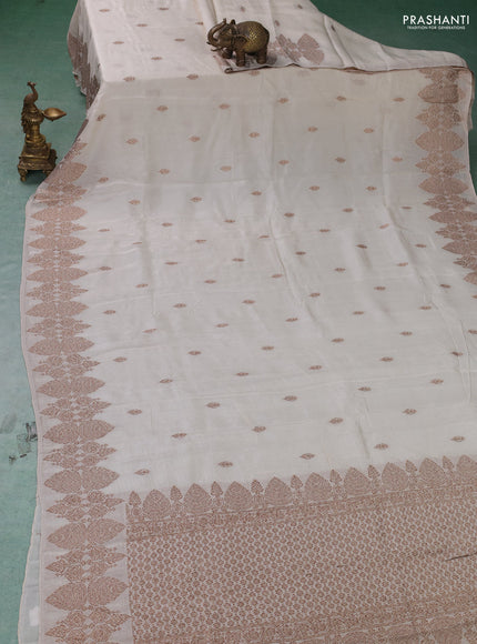 Banarasi semi raw silk saree off white with thread & zari woven buttas and woven border