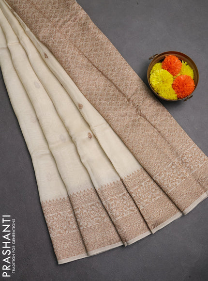 Banarasi semi raw silk saree off white with thread & zari woven buttas and woven border