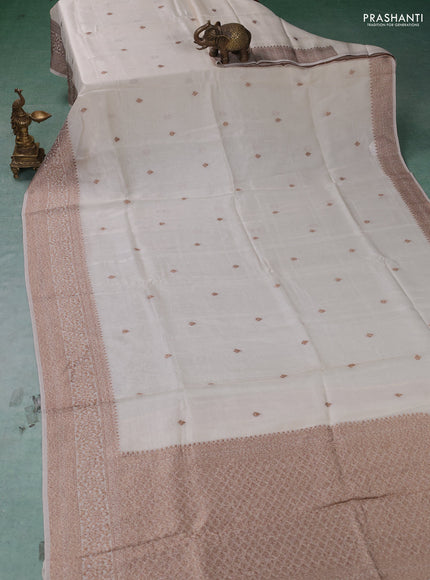 Banarasi semi raw silk saree off white with thread & zari woven buttas and woven border