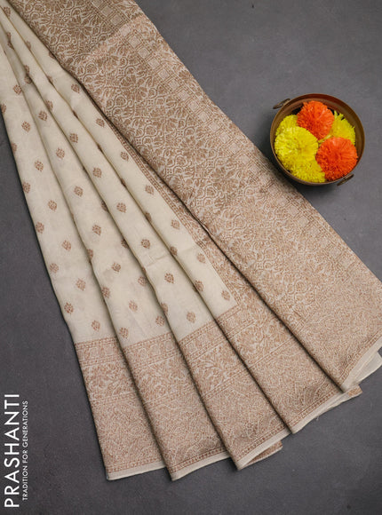 Banarasi semi raw silk saree cream with thread & zari woven buttas and woven border