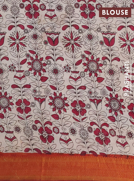 Kalamkari semi silk saree peaock blue and rust shade with allover prints and mangalgiri border