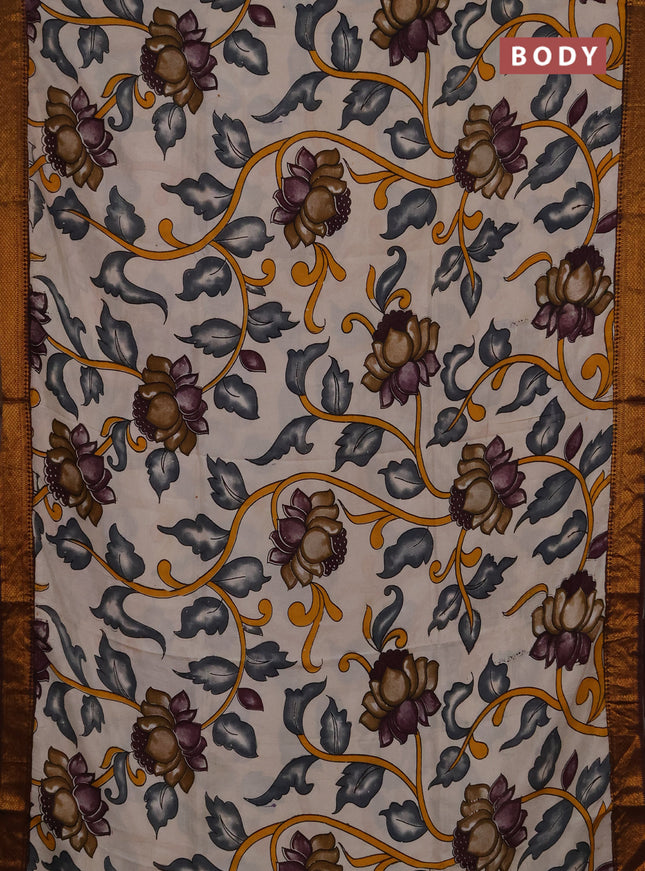 Kalamkari semi silk saree beige and coffee brown with allover prints and mangalgiri border