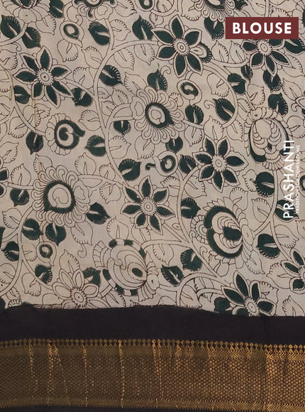 Kalamkari semi silk saree bottle green and black with allover prints and mangalgiri border
