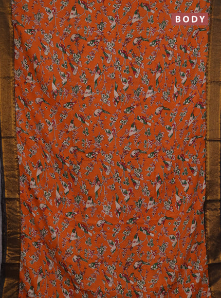 Kalamkari semi silk saree orange and black with allover prints and mangalgiri border