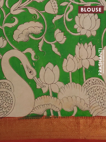Kalamkari semi silk saree beige and rust shade with allover prints and mangalgiri border