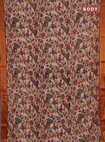 Kalamkari semi silk saree beige and rust shade with allover prints and mangalgiri border