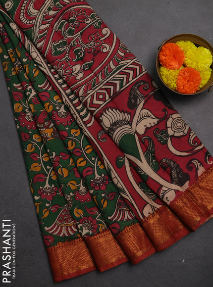 Kalamkari semi silk saree green and rust shade with allover prints and mangalgiri border