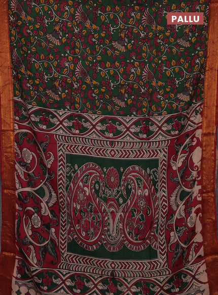 Kalamkari semi silk saree green and rust shade with allover prints and mangalgiri border