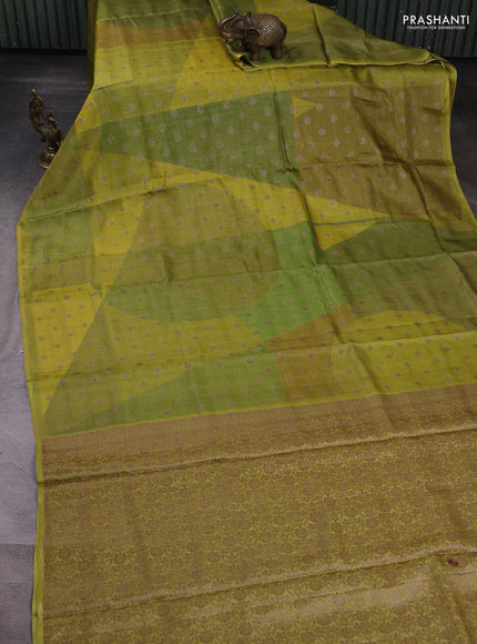 Banarasi tussar silk saree light green with allover prints & woven buttas in borderless style
