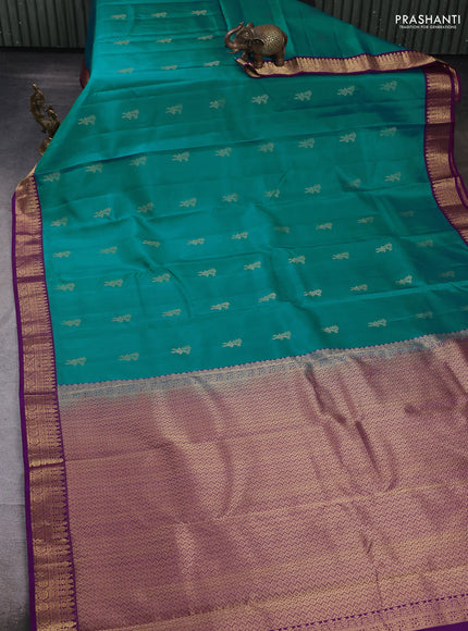 Pure kanchipuram silk saree teal green shade and purple with zari woven buttas and zari woven border