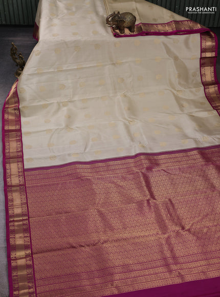 Pure kanchipuram silk saree off white and purple with annam zari woven buttas and zari woven korvai border