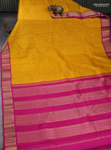 Pure kanchipuram silk saree mustard yellow and pink with zari woven buttas and ari woven border