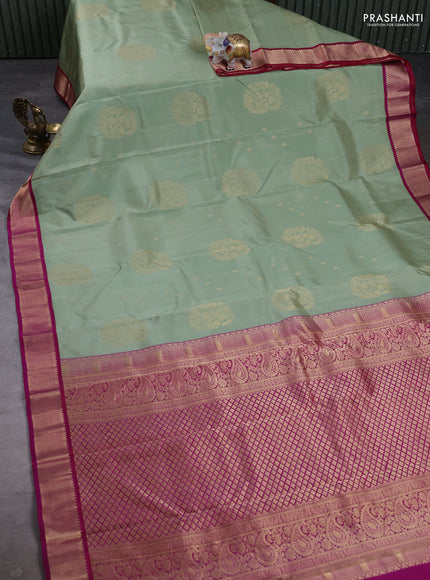 Pure kanchipuram silk saree pastel green and pink with zari woven buttas and zari woven korvai border