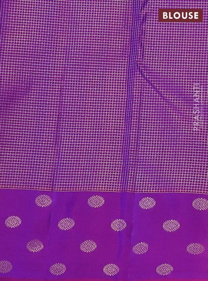Pure kanchipuram silk saree peacock blue and purple with allover zari woven small zari checked pattern and zari woven butta border