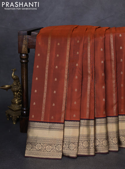Pure kanchipuram silk saree orange and coffee brown with allover zari weaves and zari woven border