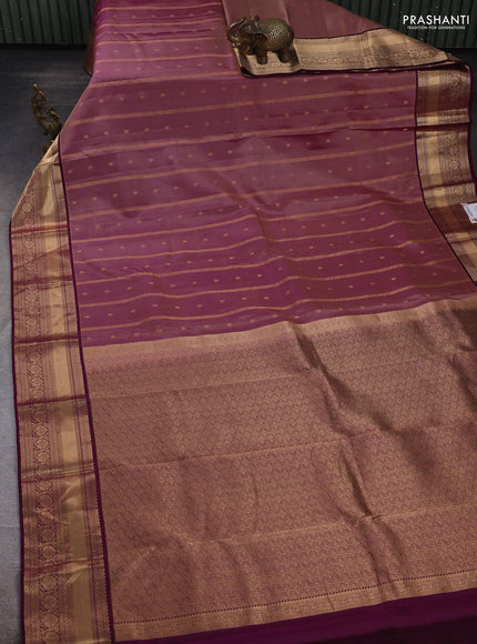 Pure kanchipuram silk saree pink shade and deep purple with allover zari weaves and zari woven border
