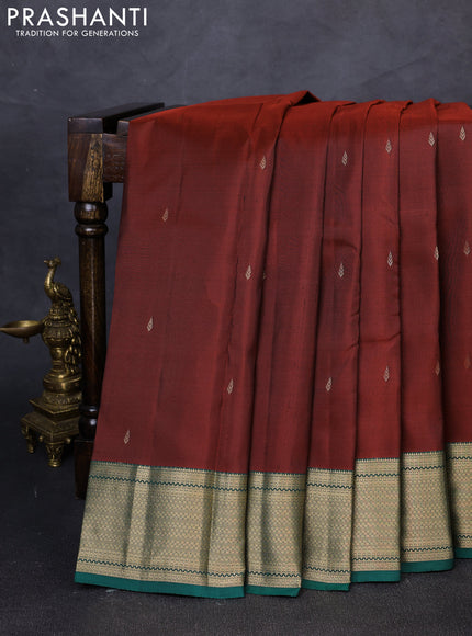 Pure kanchipuram silk saree rust shade and green with zari woven buttas and zari woven border