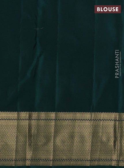 Pure kanchipuram silk saree rust shade and green with zari woven buttas and zari woven border