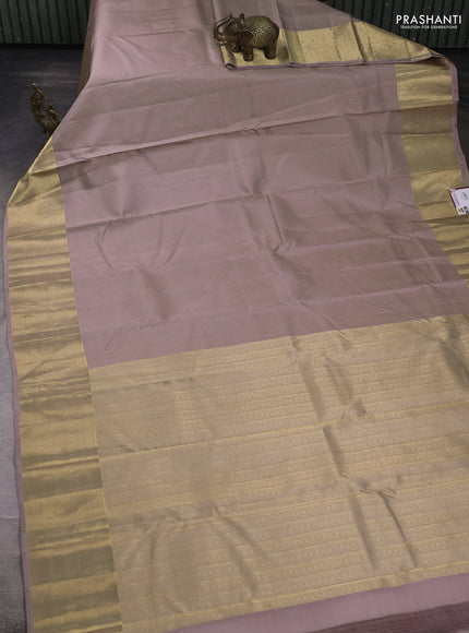 Pure kanchipuram silk saree pastel pink and maroon with allover zari stripes pattern and zari woven border