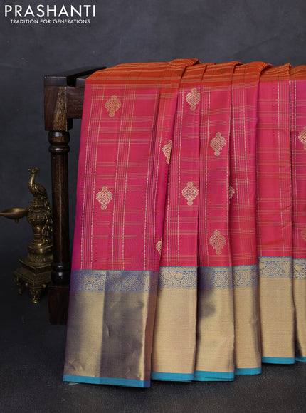 Pure kanchipuram silk saree pinkish orange and teal blue with allover zari checked pattern & buttas and zari woven border
