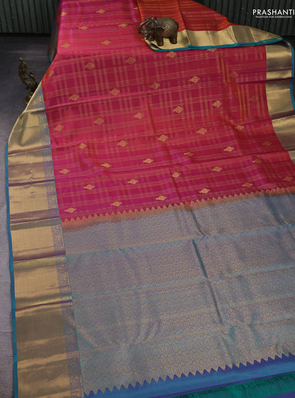 Pure kanchipuram silk saree pinkish orange and teal blue with allover zari checked pattern & buttas and zari woven border