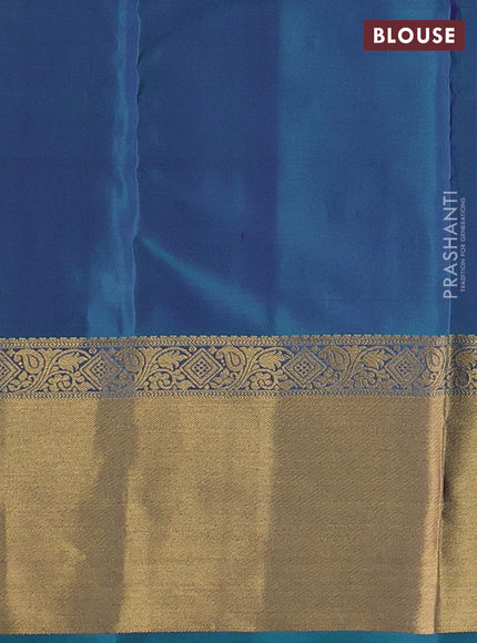 Pure kanchipuram silk saree pinkish orange and teal blue with allover zari checked pattern & buttas and zari woven border