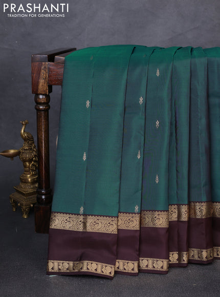 Pure kanchipuram silk saree peacock green and coffee brown with zari woven buttas and rettapet zari woven border