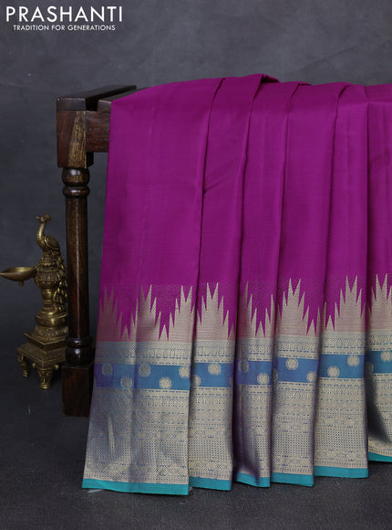 Pure kanchipuram silk saree purple and teal green with plain body and temple design zari woven border