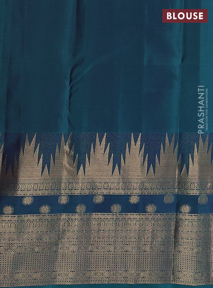 Pure kanchipuram silk saree purple and teal green with plain body and temple design zari woven border