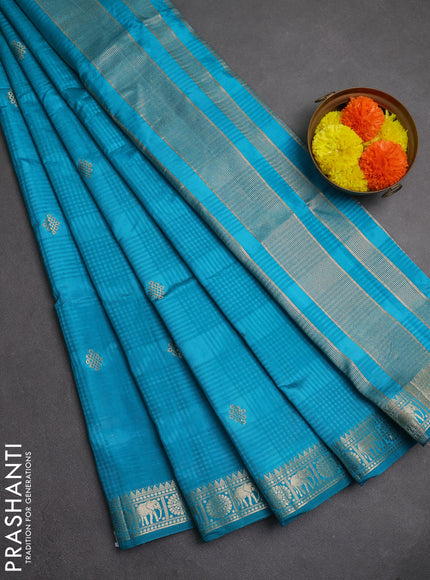 Semi raw silk saree teal blue with allover self emboss & zari buttas and zari woven border