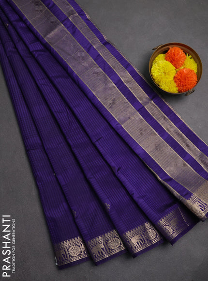 Semi raw silk saree blue with allover self emboss & zari buttas and zari woven border