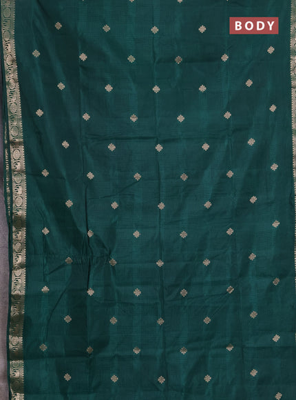 Semi raw silk saree green with allover self emboss & zari buttas and zari woven border
