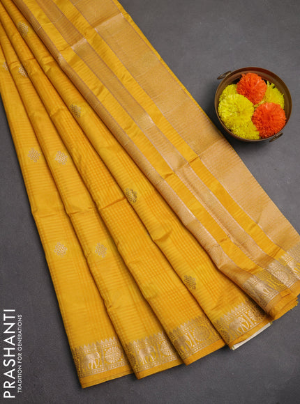 Semi raw silk saree mustard yellow with allover self emboss & zari buttas and zari woven border