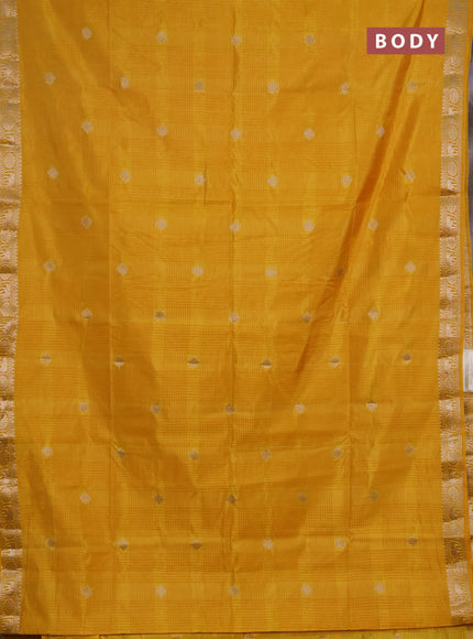 Semi raw silk saree mustard yellow with allover self emboss & zari buttas and zari woven border