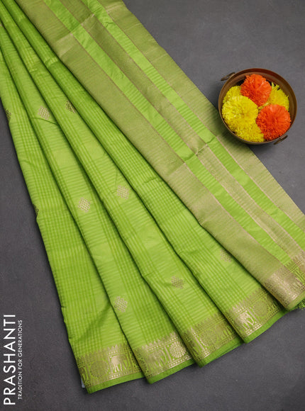 Semi raw silk saree light green with allover self emboss & zari buttas and zari woven border
