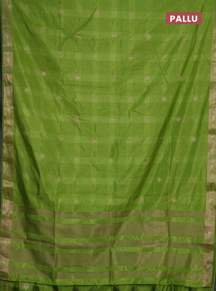 Semi raw silk saree light green with allover self emboss & zari buttas and zari woven border
