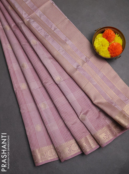 Semi raw silk saree pastel pink with allover self emboss & zari buttas and zari woven border