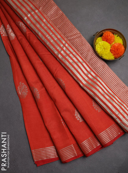 Semi raw silk saree rustic orange with silver zari woven buttas and zari woven border
