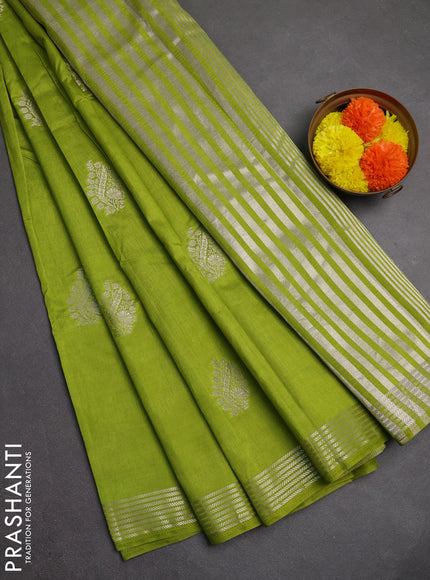 Semi raw silk saree light green with silver zari woven buttas and zari woven border