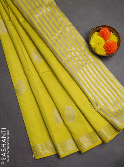Semi raw silk saree lime yellow with silver zari woven buttas and zari woven border
